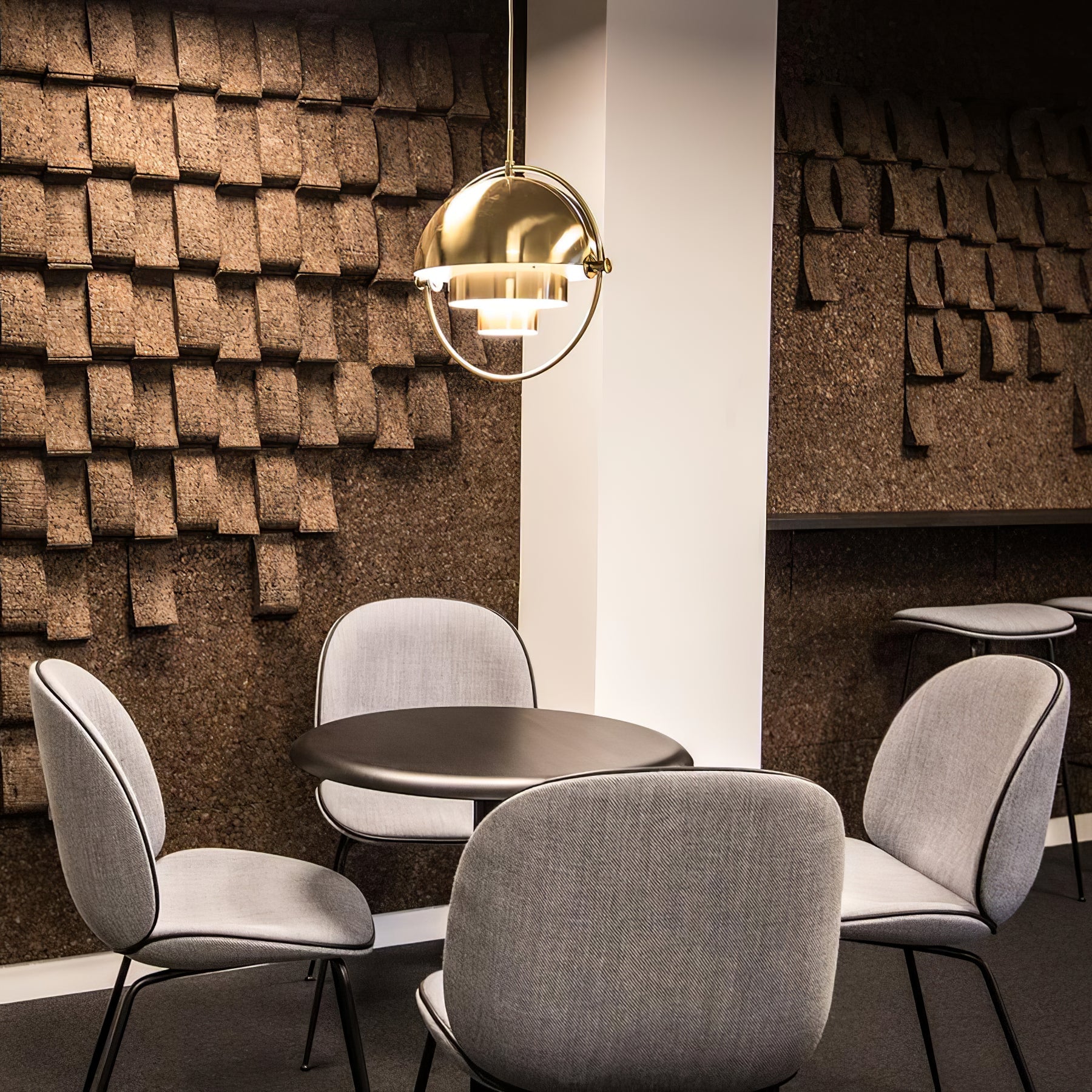 Multi-Lite pendant light in a chrome finish reflecting the surrounding room