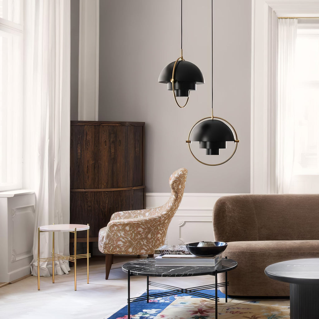 Multi-Lite pendant light over a dining table casting a focused downward pool of light