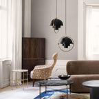 Multi-Lite pendant light over a dining table casting a focused downward pool of light