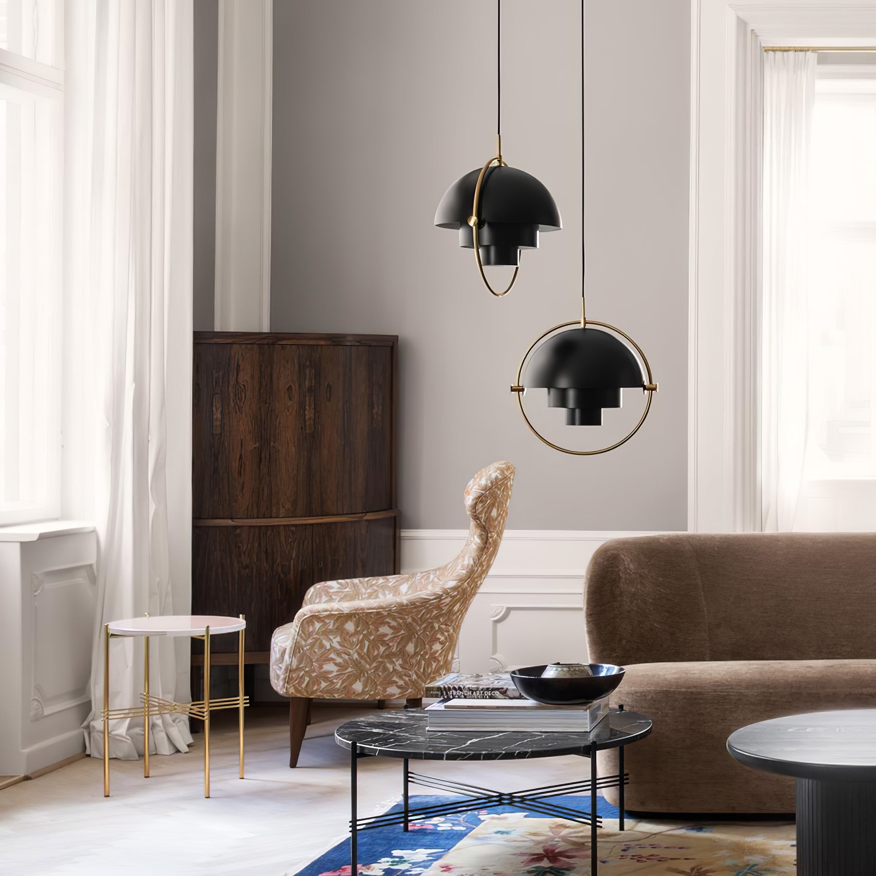 Multi-Lite pendant light over a dining table casting a focused downward pool of light