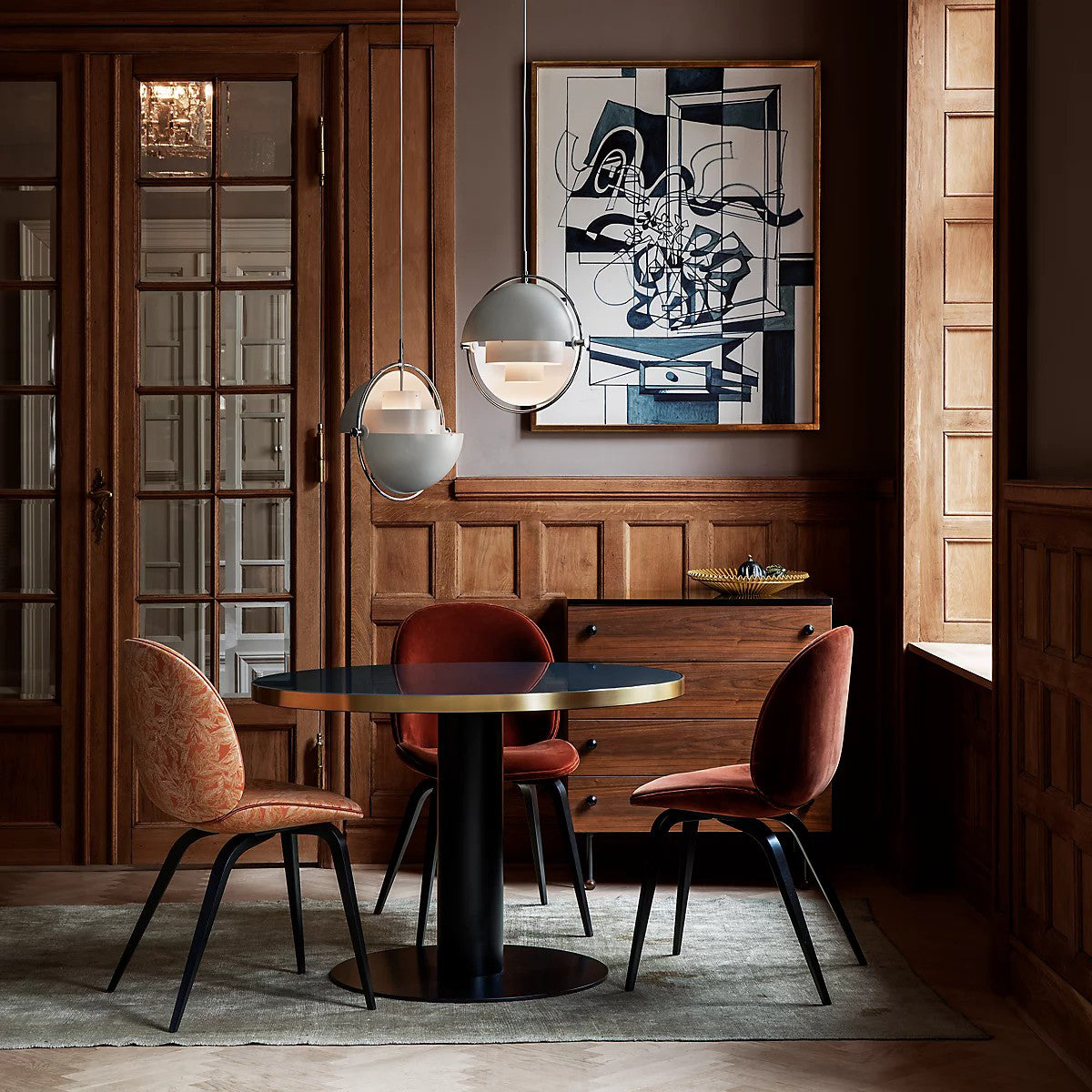 Multi-Lite pendant light shown from below highlighting the adjustable shade halves