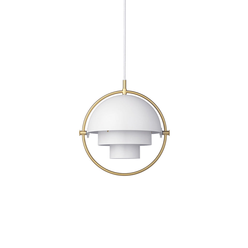 Multi-Lite pendant light in a copper finish suspended above a seating area