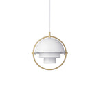 Multi-Lite pendant light in a copper finish suspended above a seating area