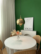 Multi-Lite pendant light in a chrome finish reflecting the surrounding room