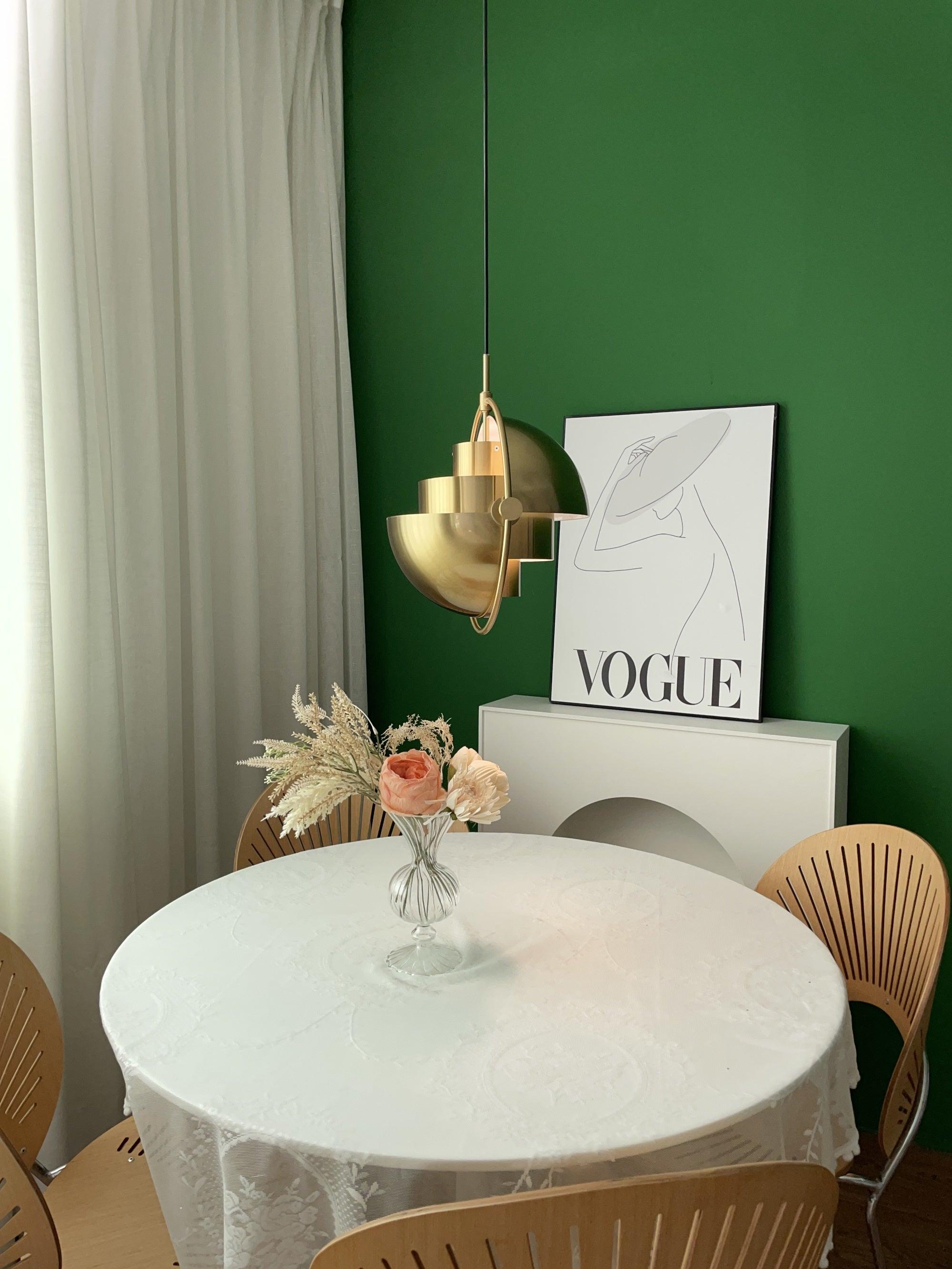 Multi-Lite pendant light shown from below highlighting the adjustable shade halves