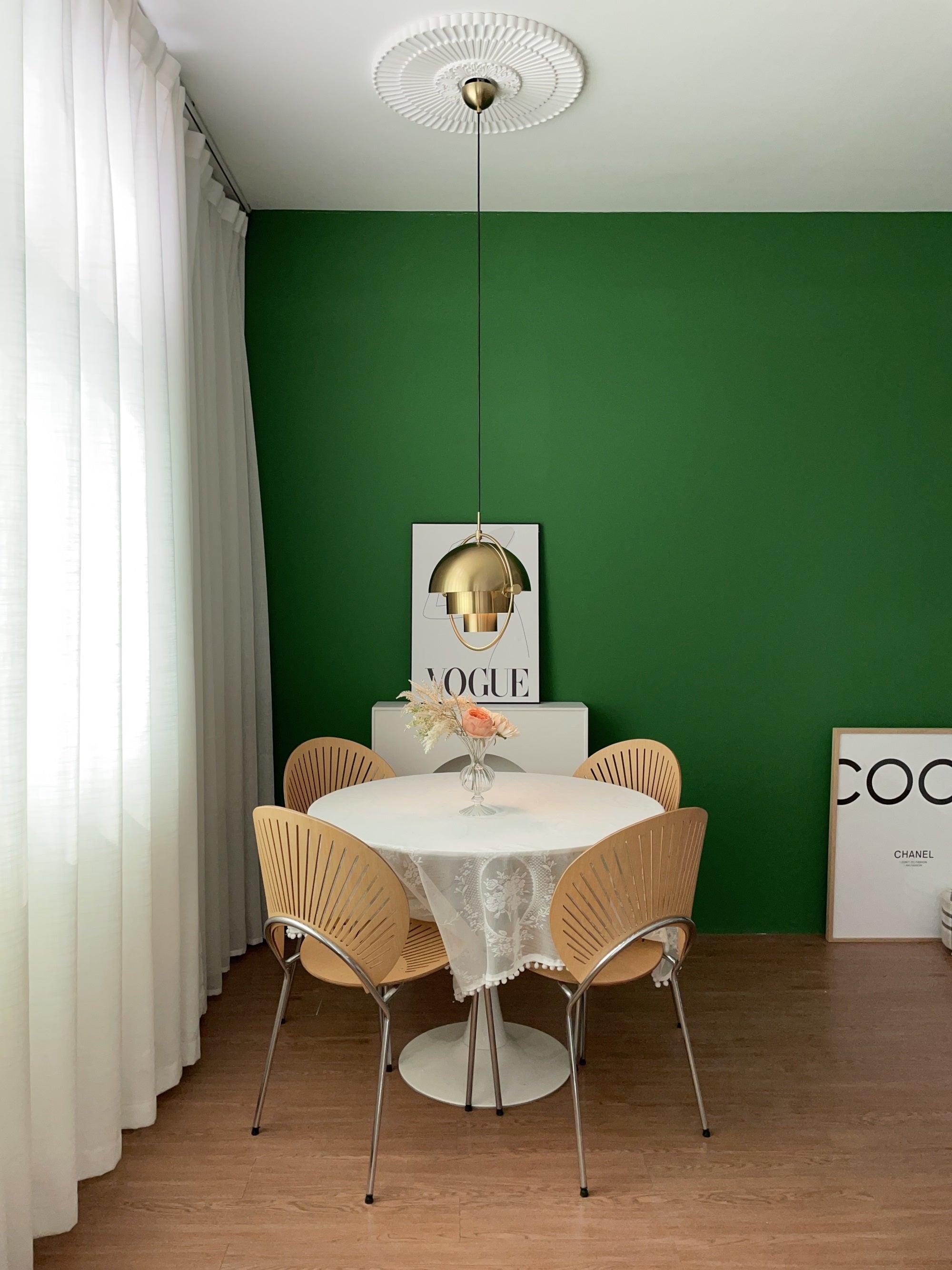 Multi-Lite pendant light arranged for sculptural indirect light in a living space