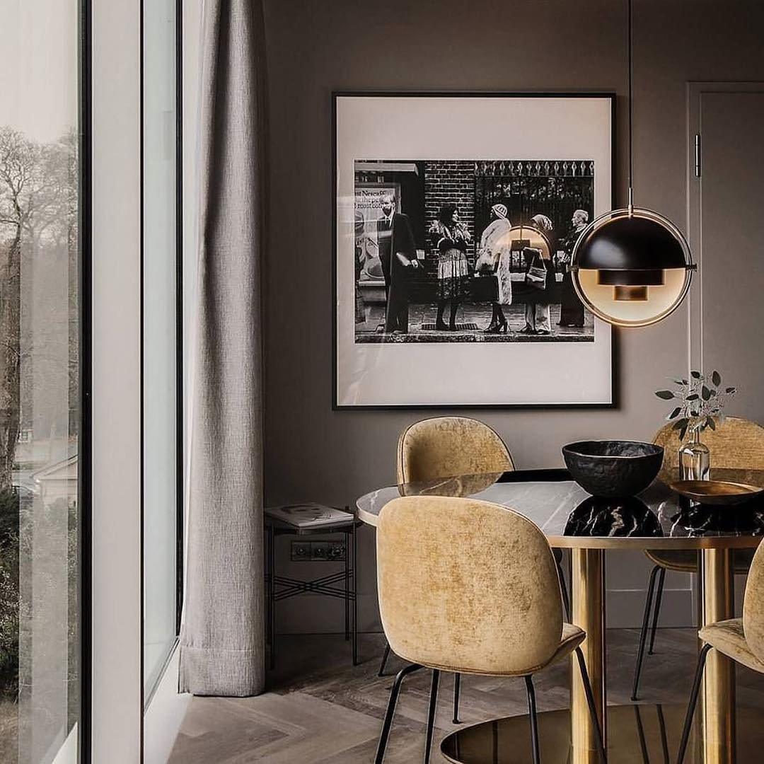 Multi-Lite pendant light in a chrome finish reflecting the surrounding room