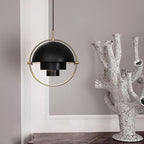 Multi-Lite pendant light in a copper finish suspended above a seating area