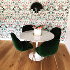 Multi-Lite pendant light with two movable hemisphere halves hanging in a styled interior