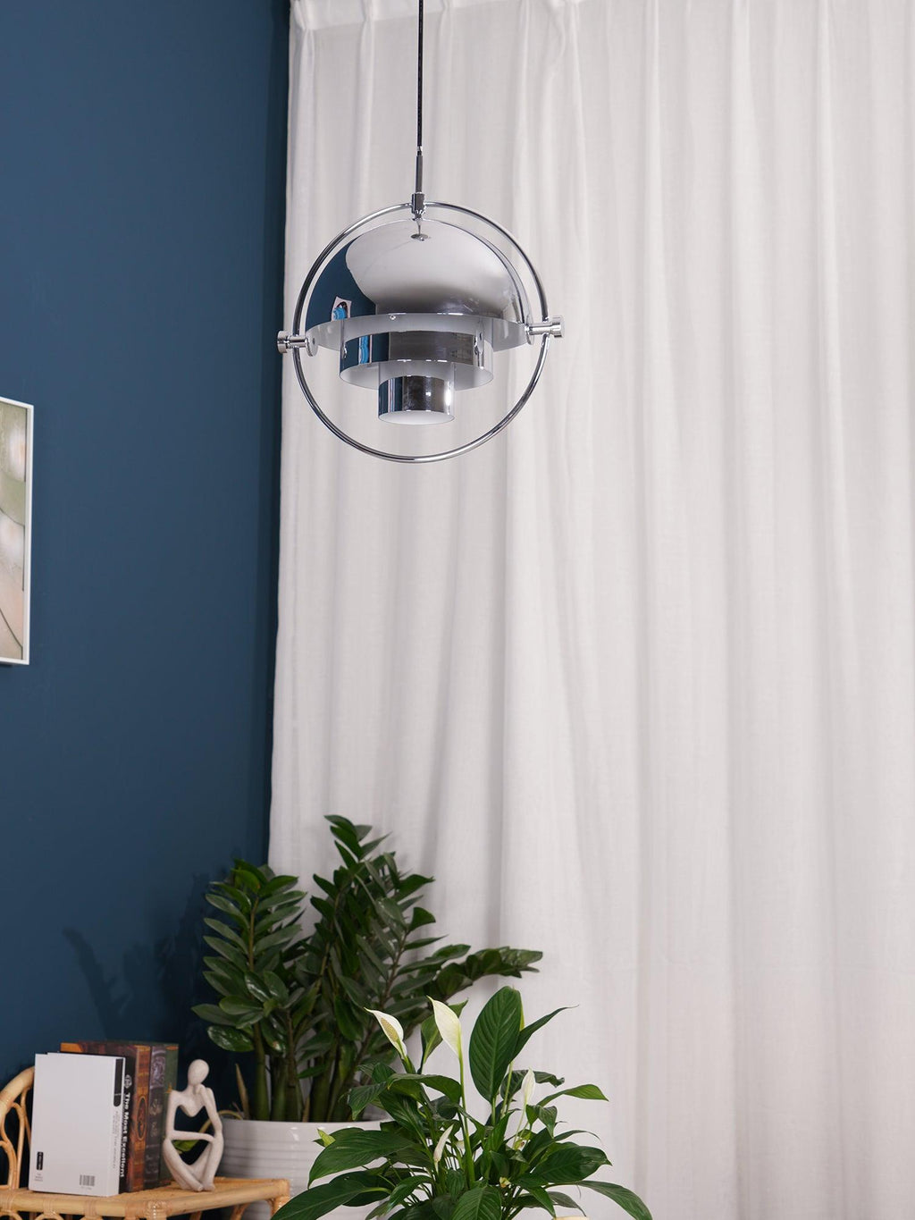 Multi-Lite pendant light shown with the shade halves turned for a soft ceiling glow