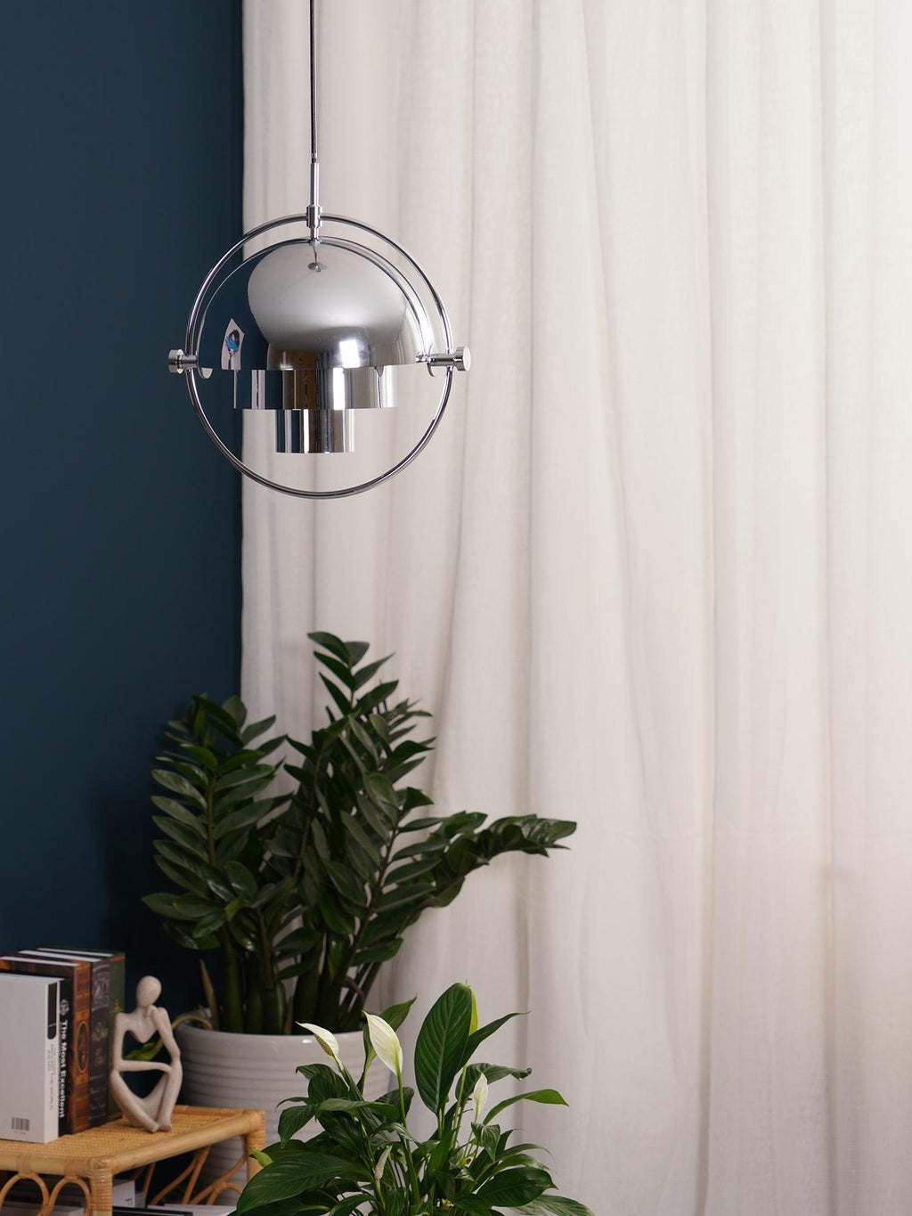 Multi-Lite pendant light shown with the shade halves turned for a soft ceiling glow