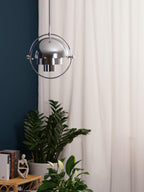 Multi-Lite pendant light shown with the shade halves turned for a soft ceiling glow