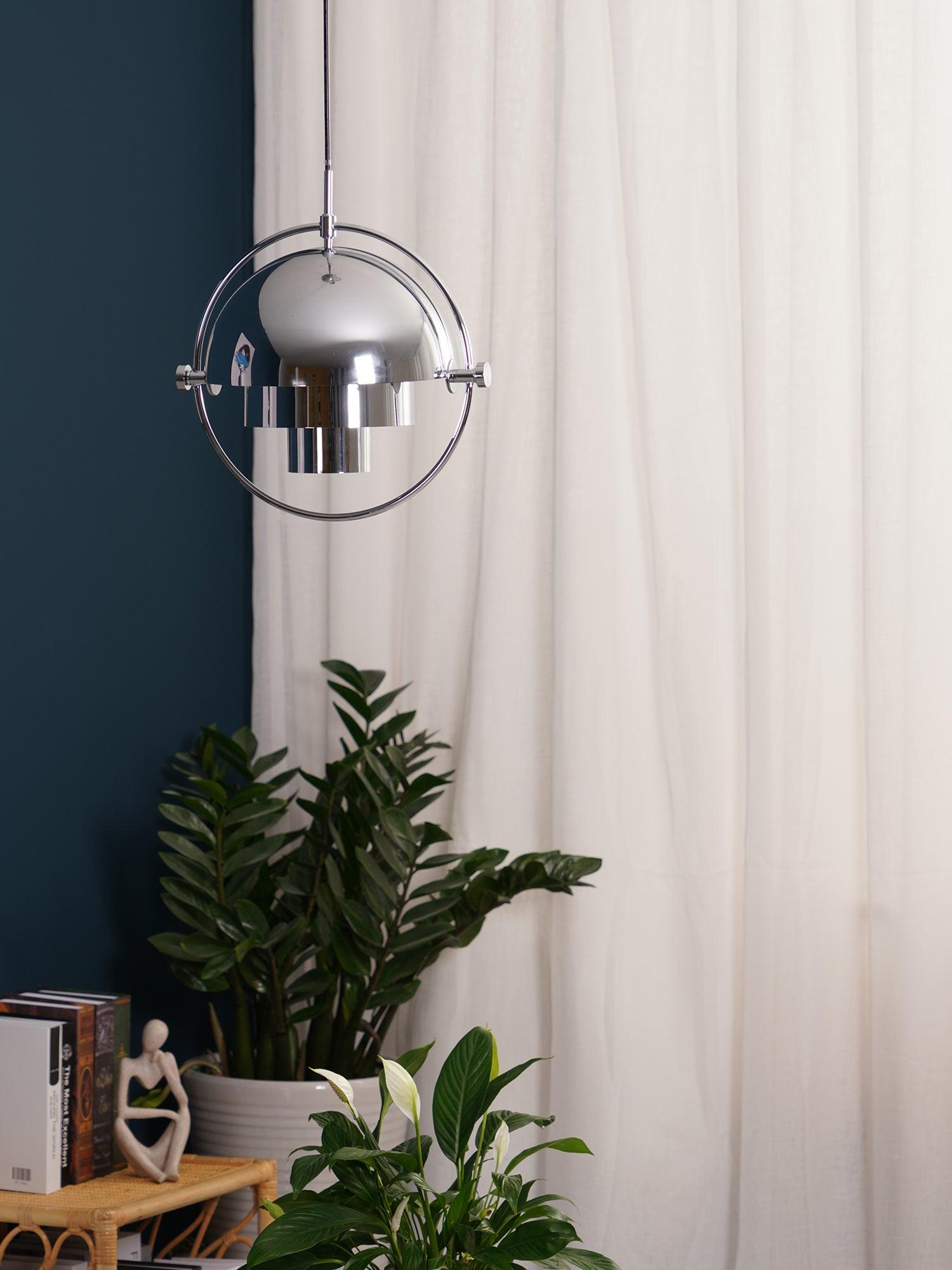 Multi-Lite pendant light shown with the shade halves turned for a soft ceiling glow