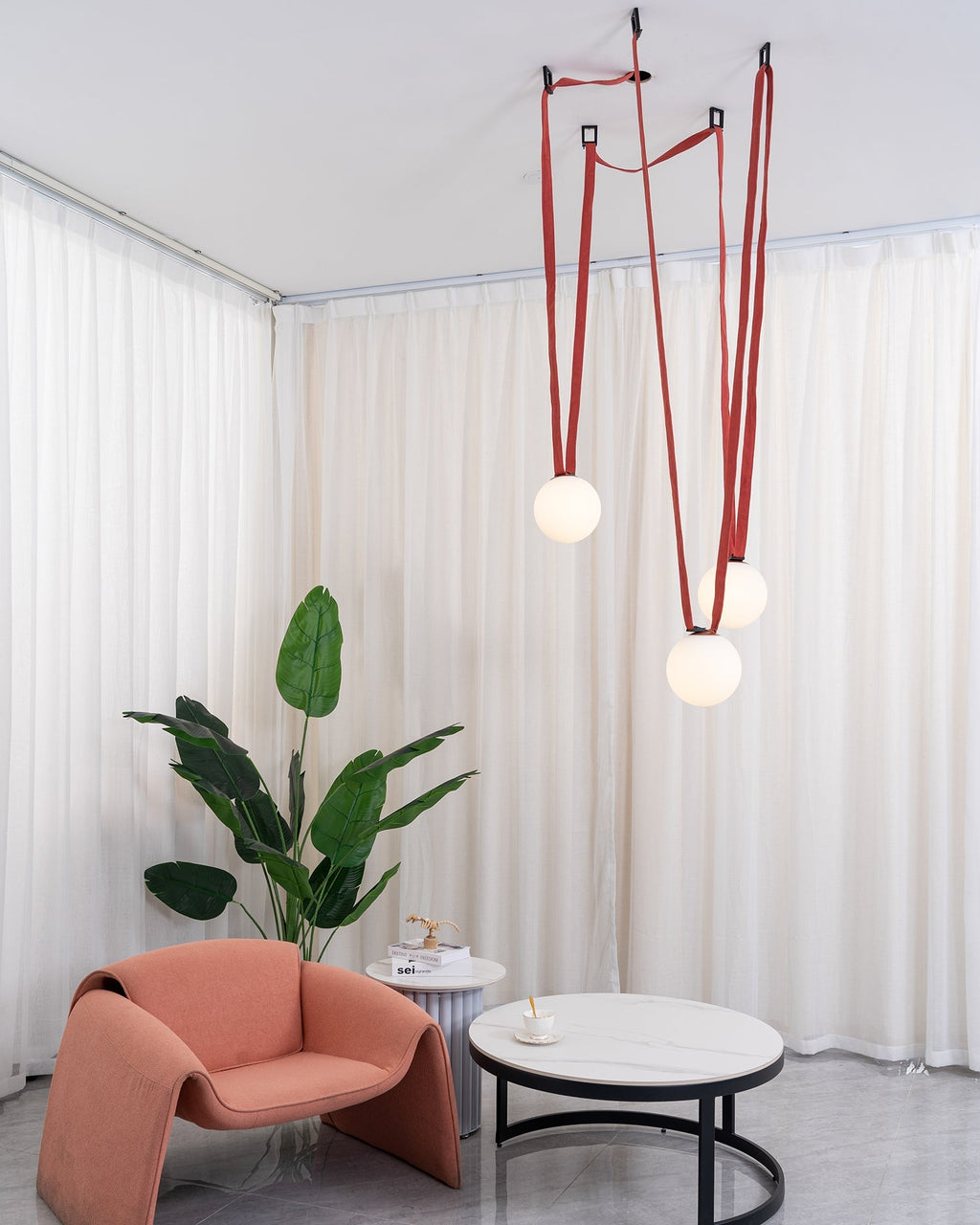 Multiple Belt Art Pendant Light white glass globe close-up