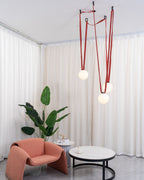 Multiple Belt Art Pendant Light white glass globe close-up