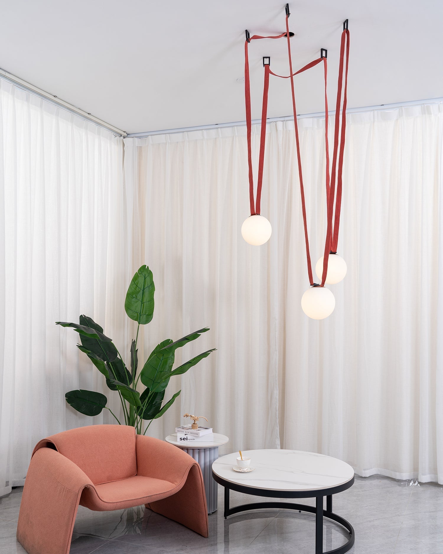 Multiple Belt Art Pendant Light white glass globe close-up
