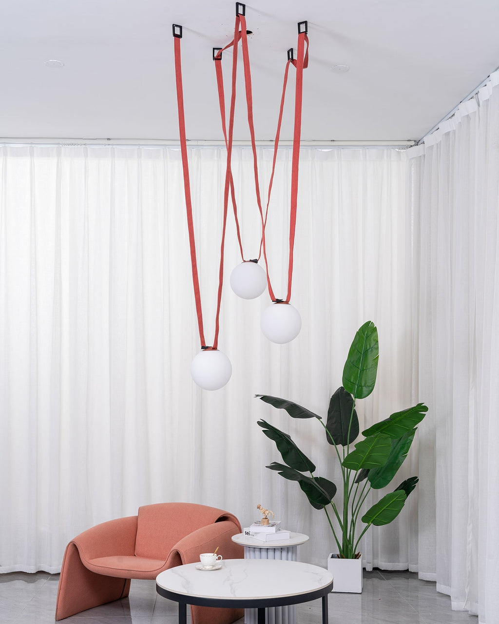 Multiple Belt Art Pendant Light leather straps and iron frame detail