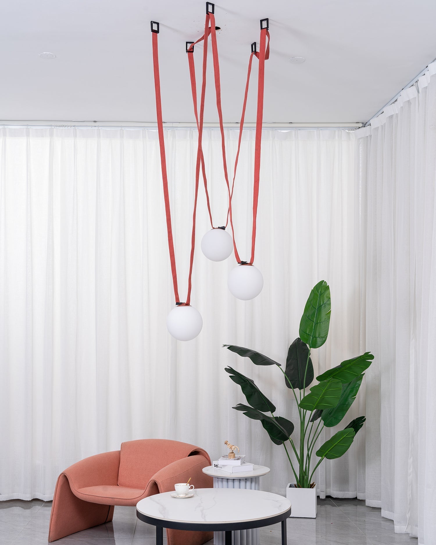 Multiple Belt Art Pendant Light leather straps and iron frame detail