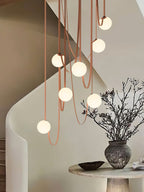 Multiple Belt Art Pendant Light viewed at an angle showing layered globes
