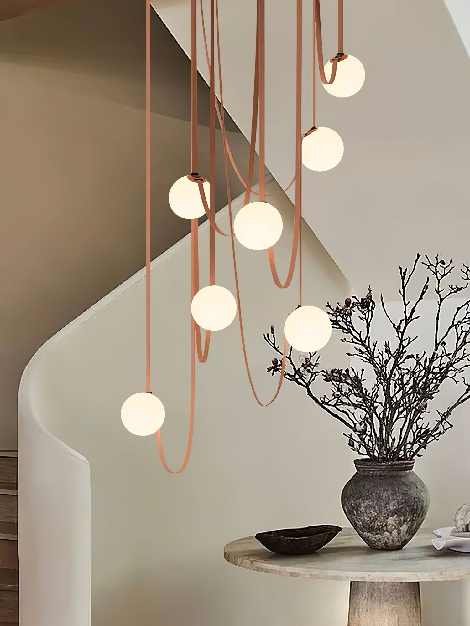 Multiple Belt Art Pendant Light viewed at an angle showing layered globes