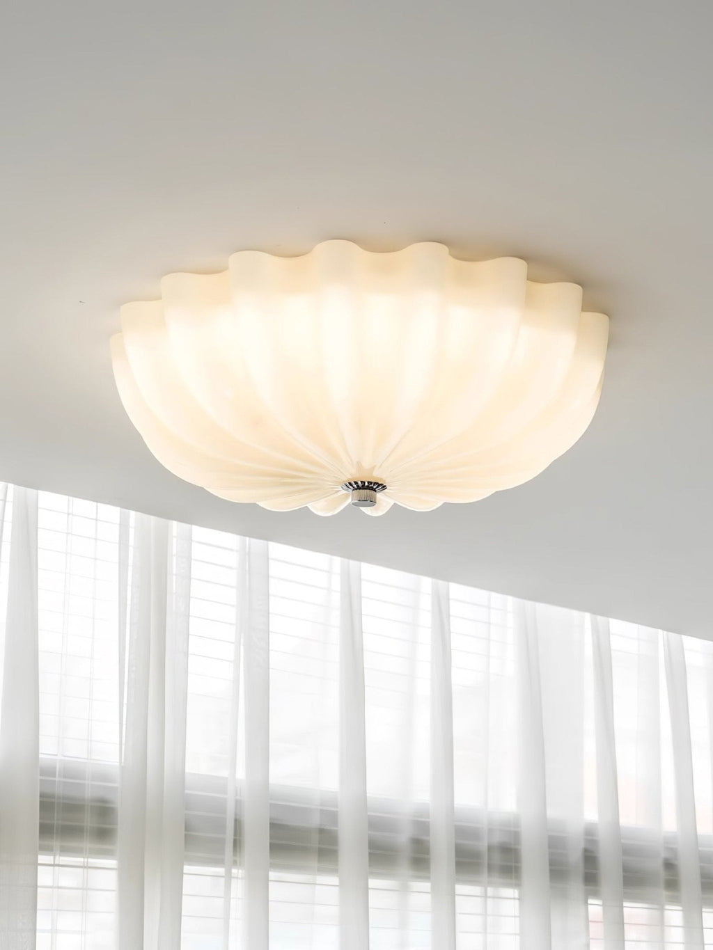 Murano Glass Flush Ceiling Light shown lit overhead