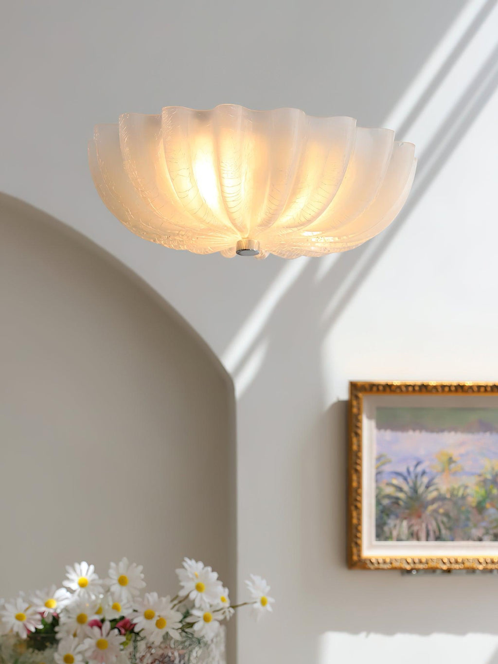 Murano Glass Flush Ceiling Light shade glowing in a room