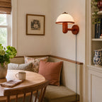 Detail of the white PC diffuser shade on the mushroom wall lamp