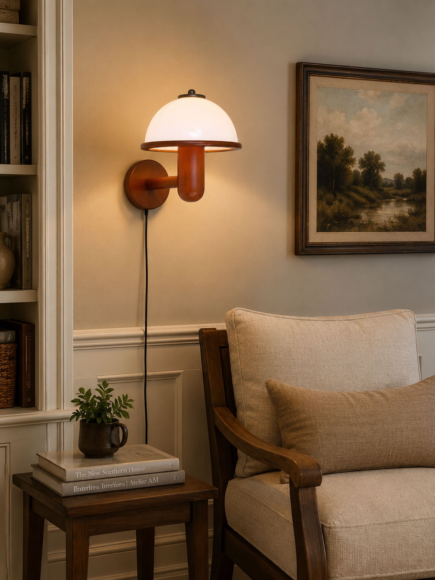 Dark oak mushroom wall lamp adding warmth to a minimalist room