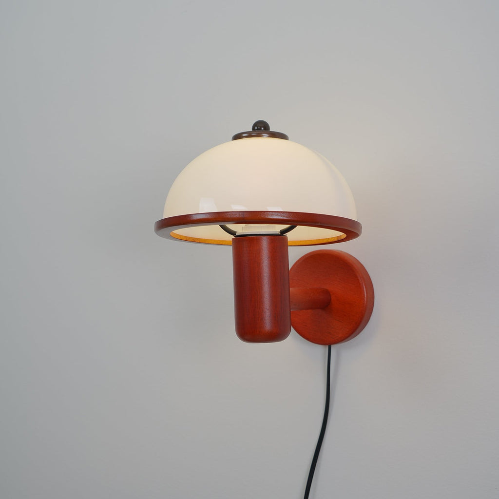 Front view of the dark oak mushroom wall lamp with white shade