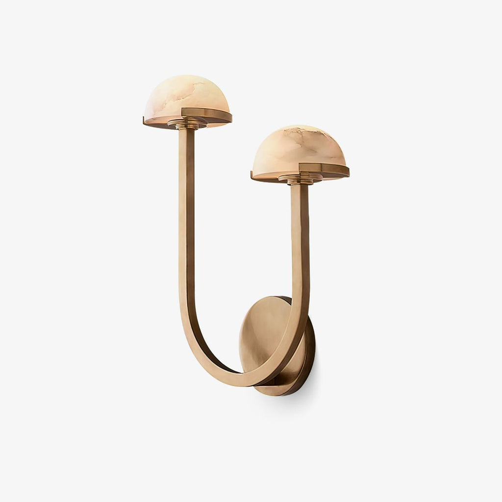 Vitalira Double Alabaster Wall Light in brass on a soft grey studio backdrop, shades unlit.