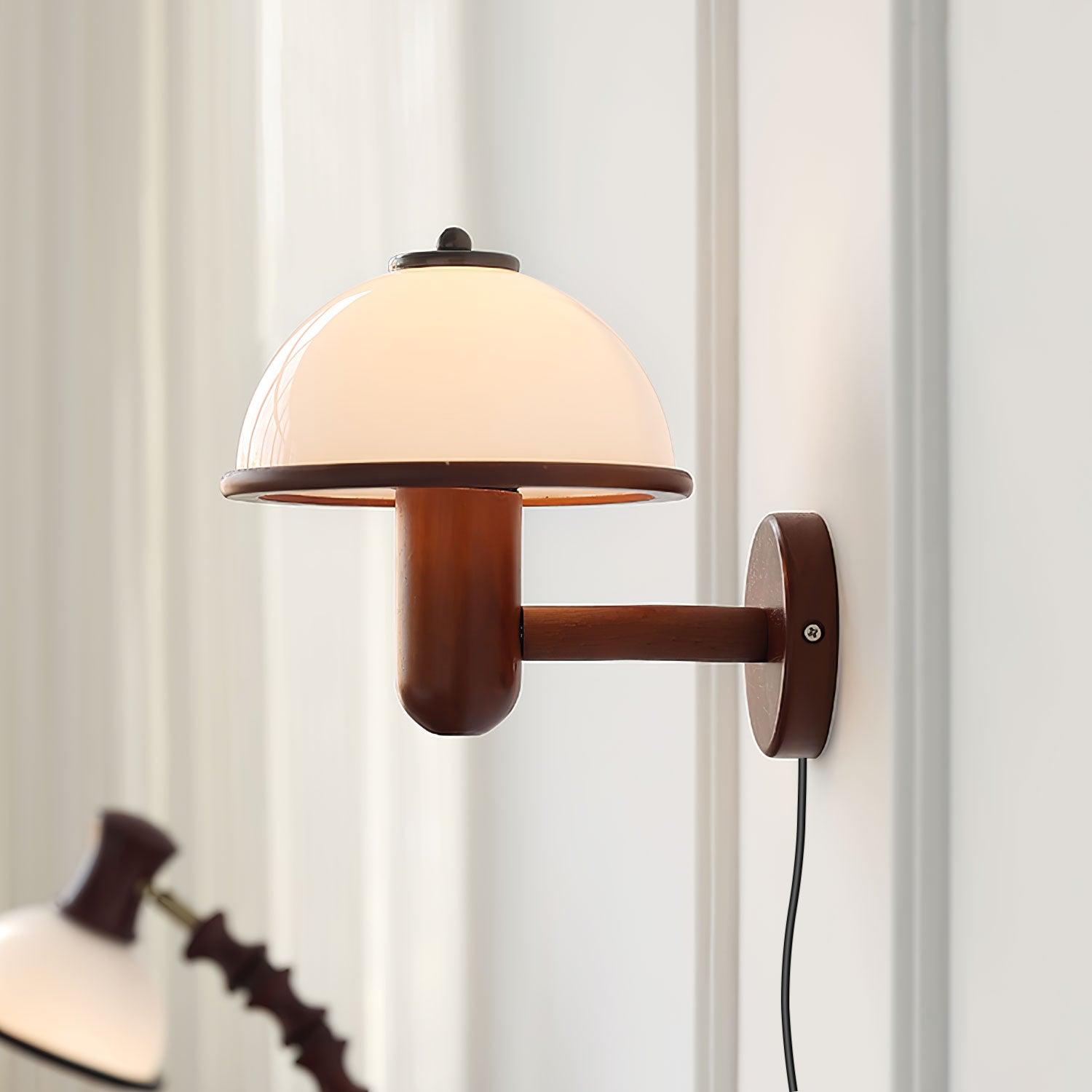 Mushroom wall lamp lighting a cozy corner at dusk