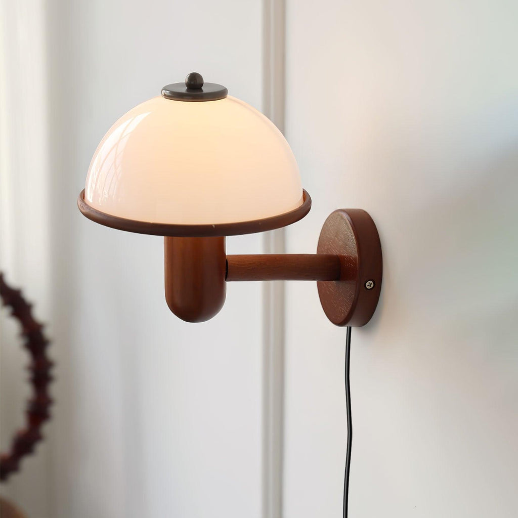 Dark oak mushroom wall lamp against a textured neutral wall