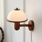 Oak mushroom wall lamp with soft ambient glow in a hallway