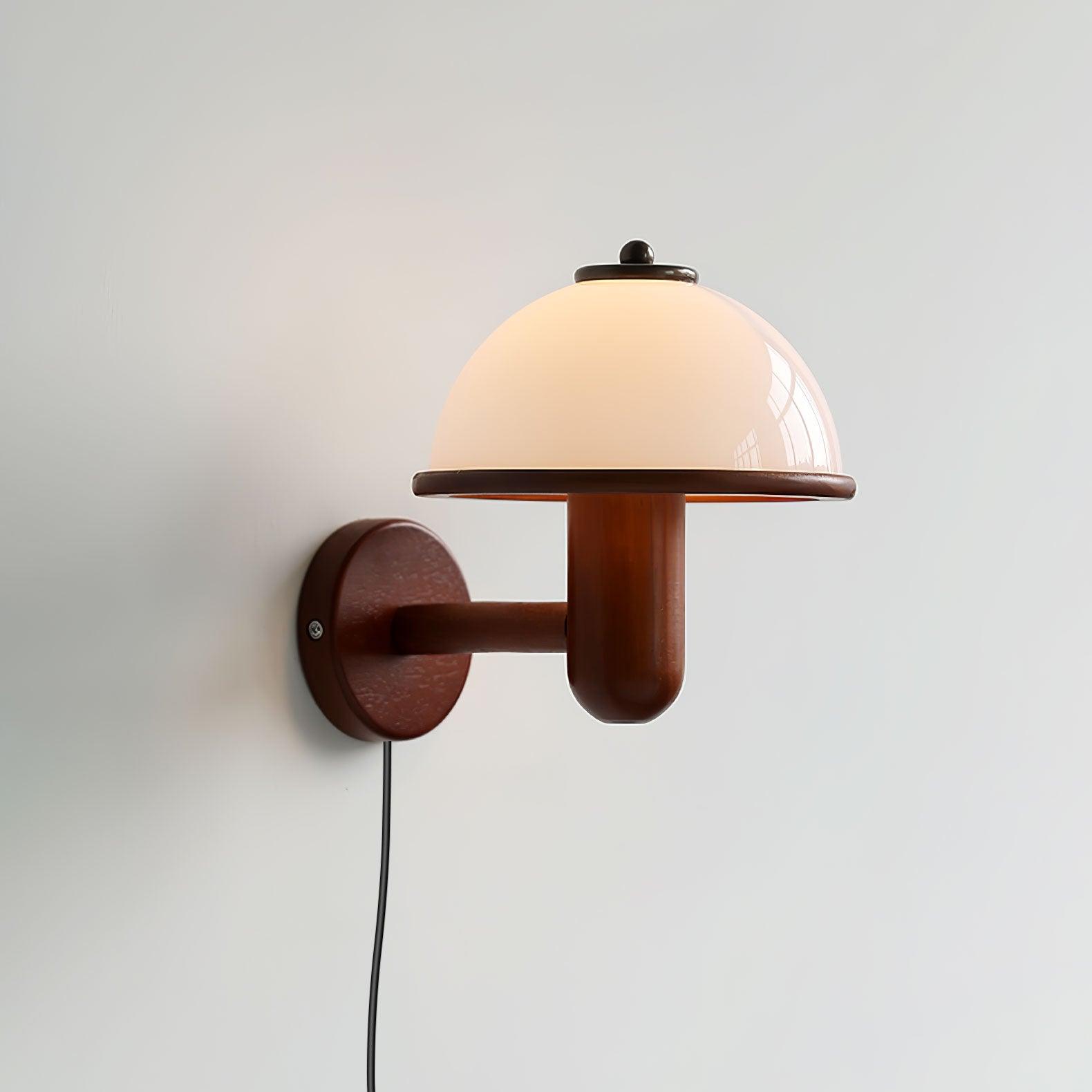 Dark oak mushroom wall lamp adding organic warmth to a room