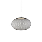 Latticed iron mesh pendant light glowing softly overhead