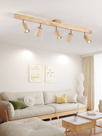 Walnut wood track spotlight fixture shown in detail