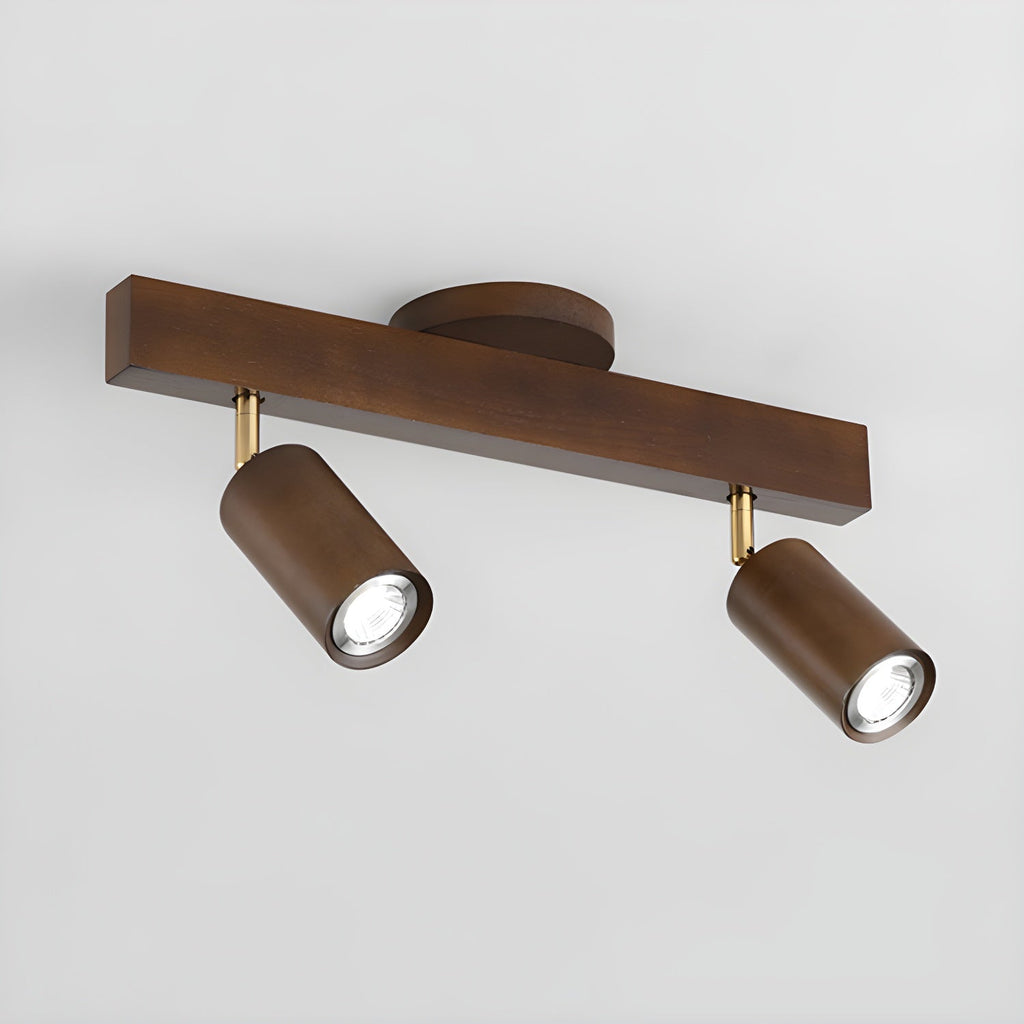Multi-head wood track spotlight lighting a cozy living space