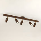 Adjustable wood-shade spotlight heads in a styled interior