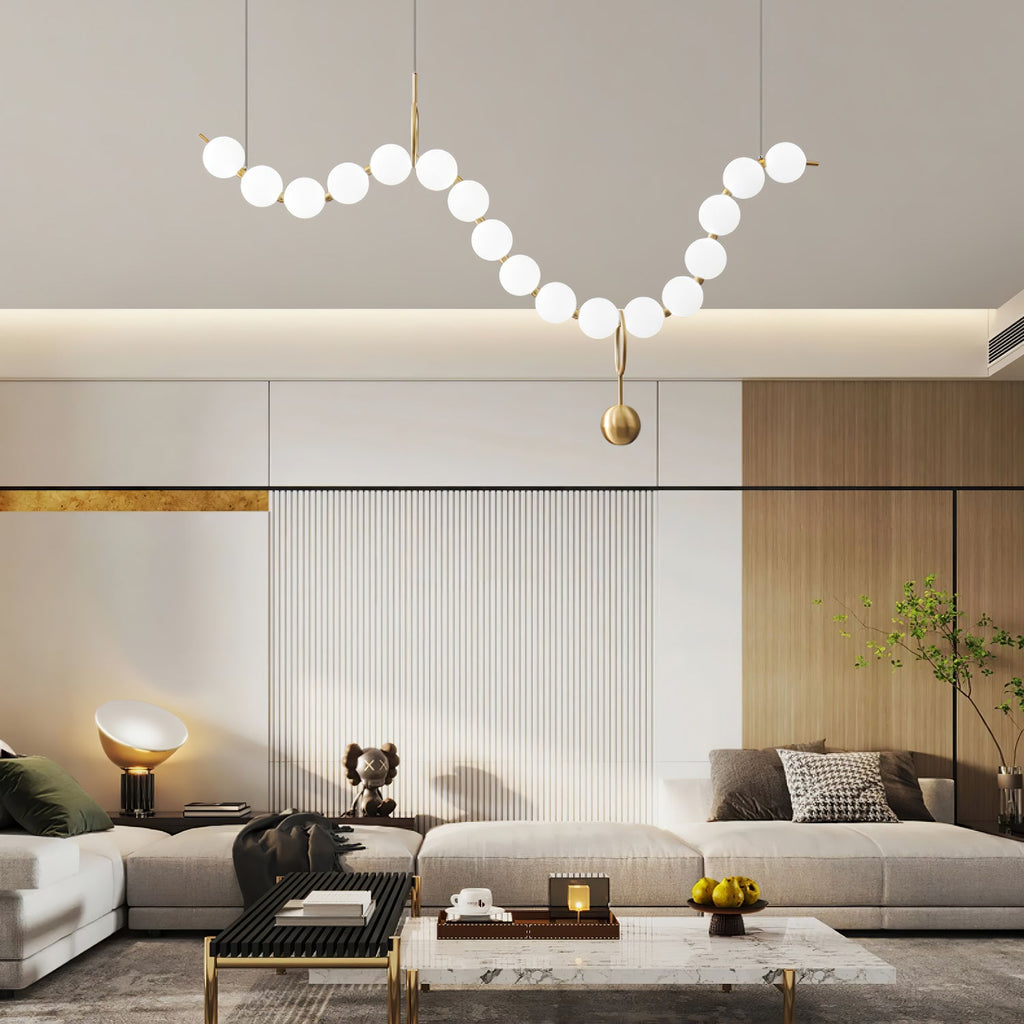 Necklace pendant light curved line of warm-lit globes