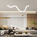 Necklace pendant light curved line of warm-lit globes