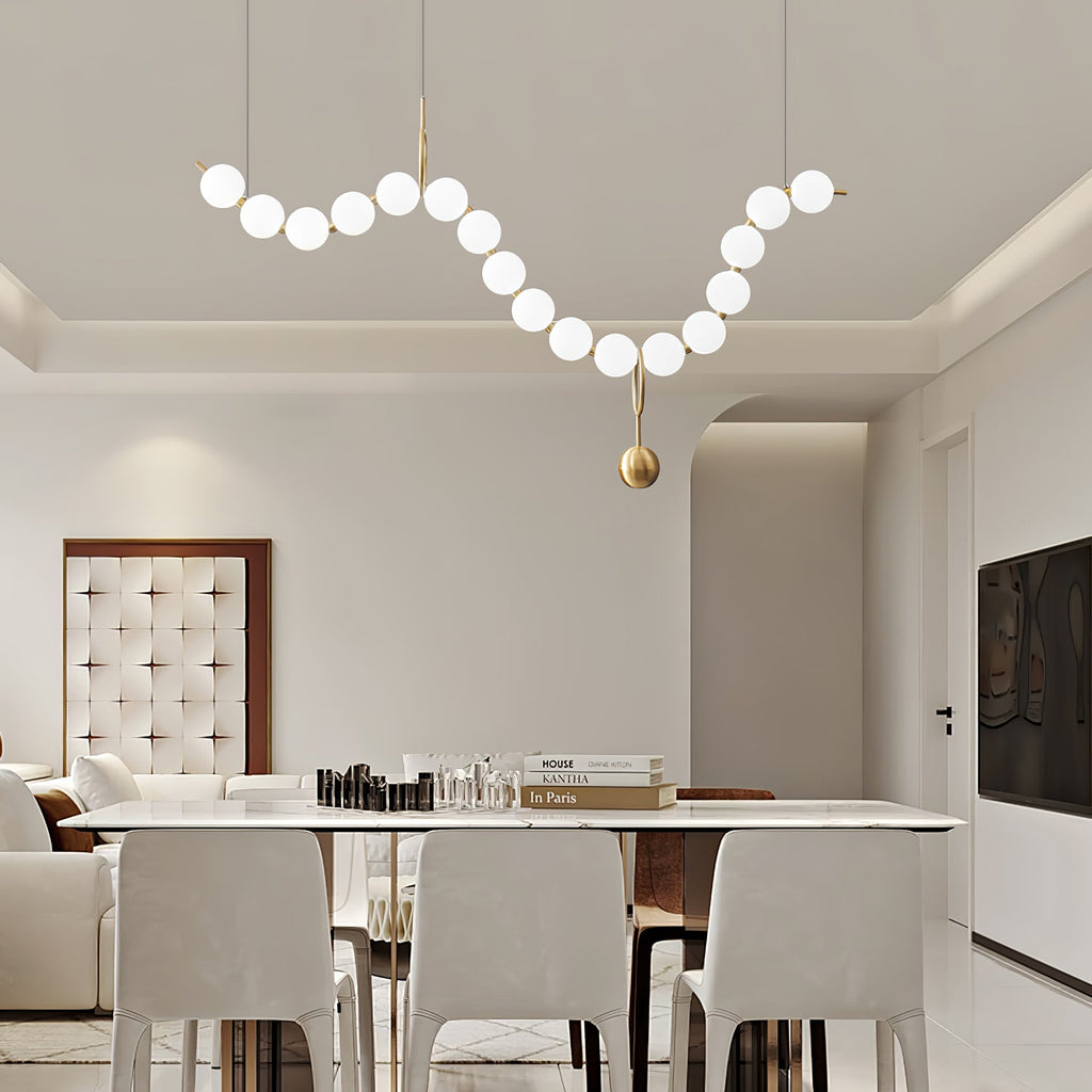 Necklace pendant light with hand-blown globes in an interior