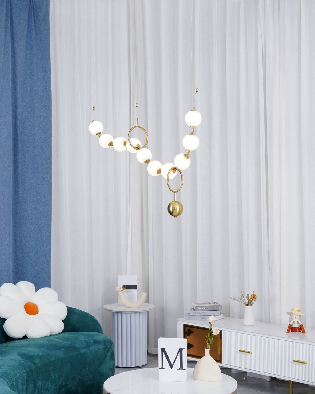 Necklace pendant light string of globes shown from below