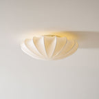 Nelson Bubble ceiling lamp hung in a cluster at staggered heights in an interior