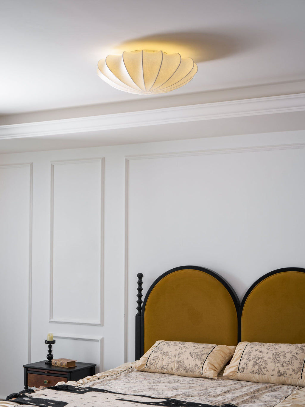 Nelson Bubble ceiling lamp over a dining setting giving off a warm refined light