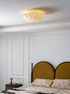Nelson Bubble ceiling lamp over a dining setting giving off a warm refined light