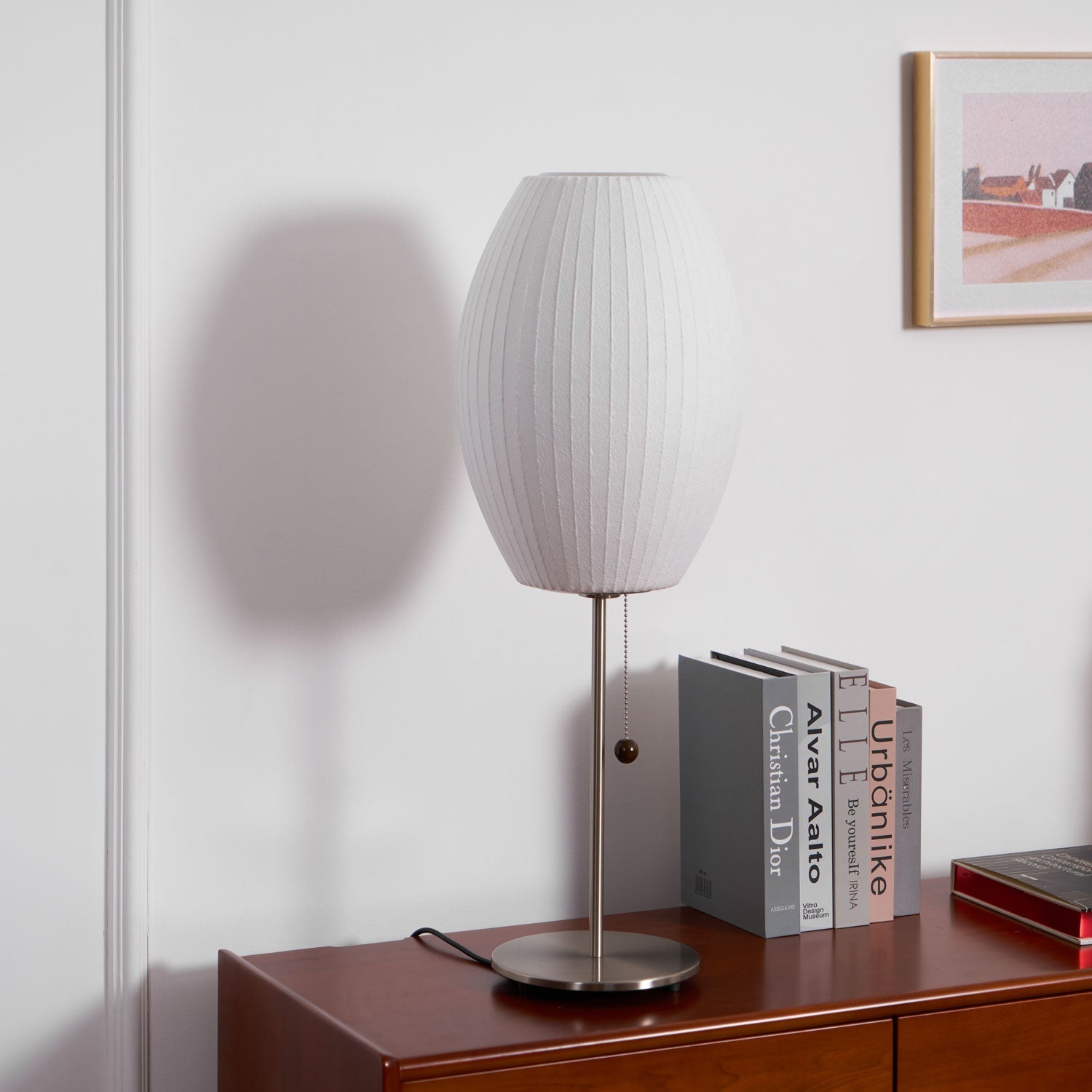 Close detail of the faux silk bubble shade's soft texture and curved form