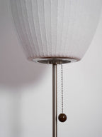 Faux silk bubble table lamp styled beside a sofa for warm ambient light