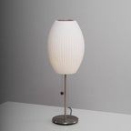 Faux silk bubble table lamp showing the pull-chain switch with wood accent