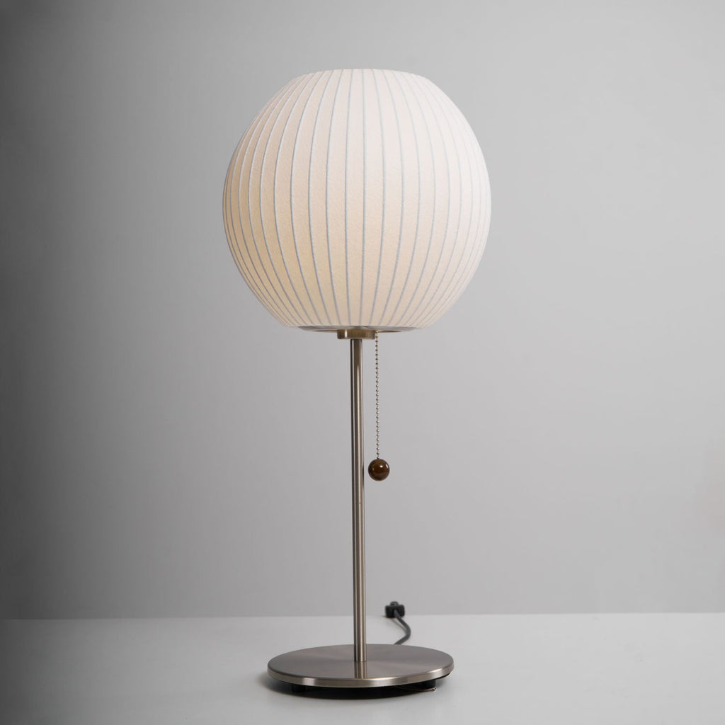 Faux silk bubble table lamp showing the pull-chain switch with wood accent
