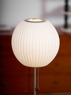 Faux silk bubble table lamp styled beside a sofa for warm ambient light